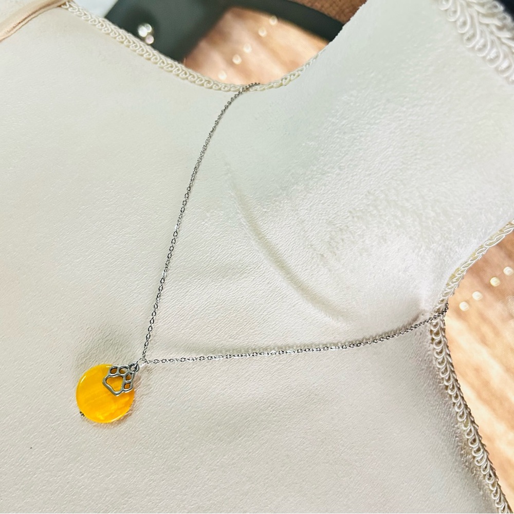 Handcrafted mustard yellow mother of pearl paw charm pendant on chain necklace